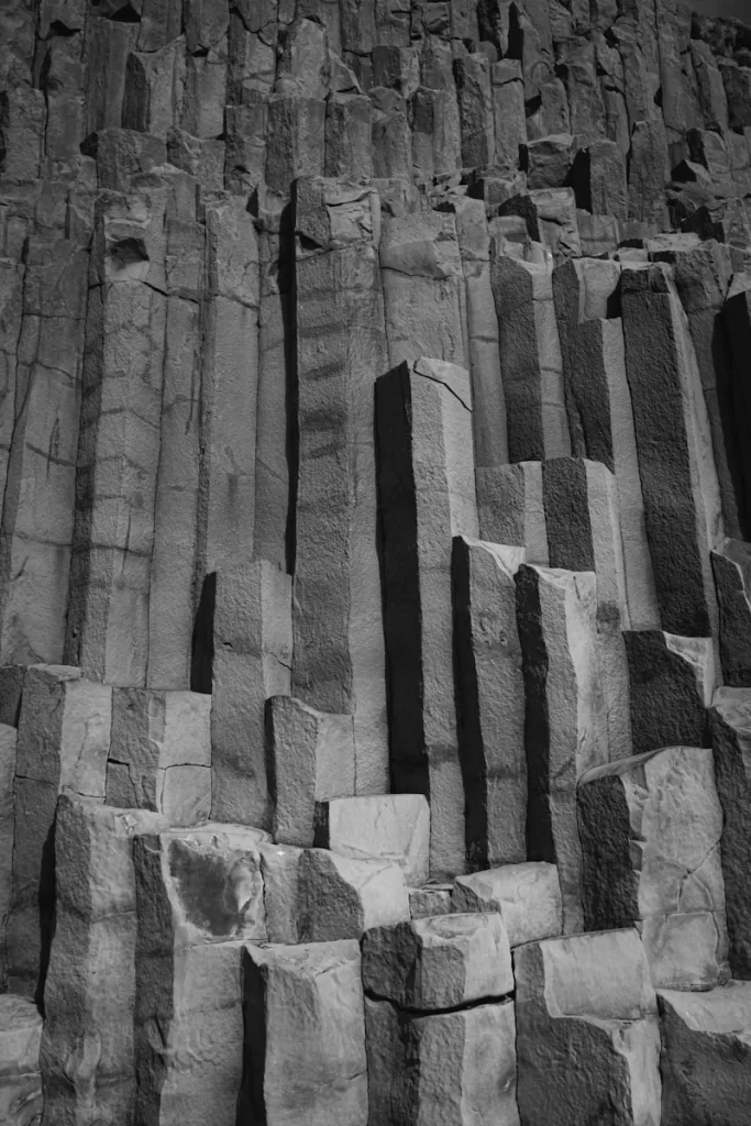 A black and white photo of a rock formation